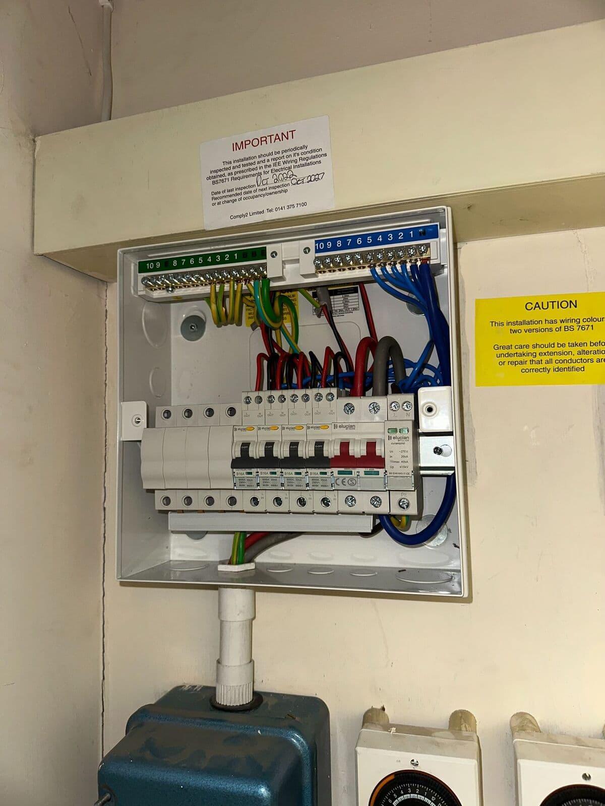 New consumer unit with the cover open showing neat wiring