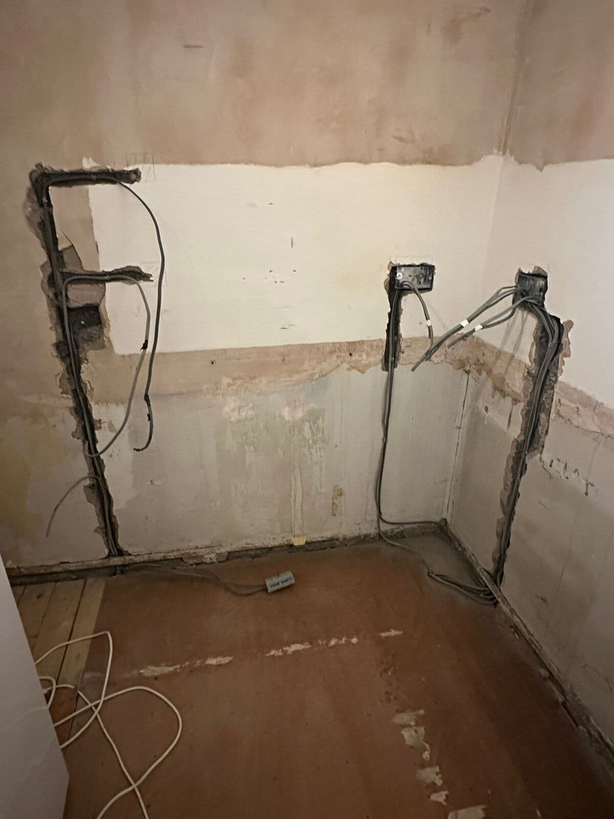 Room stripped back with new cables chased into the walls during a rewire