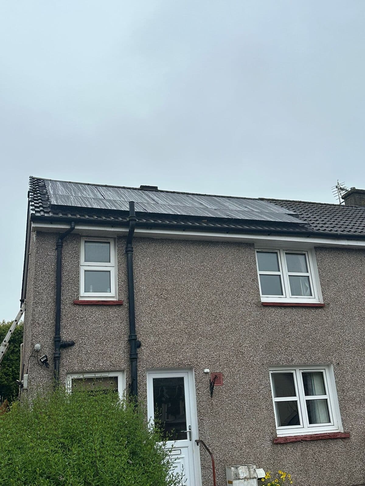 Solar panels on the roof of a semi-detached house