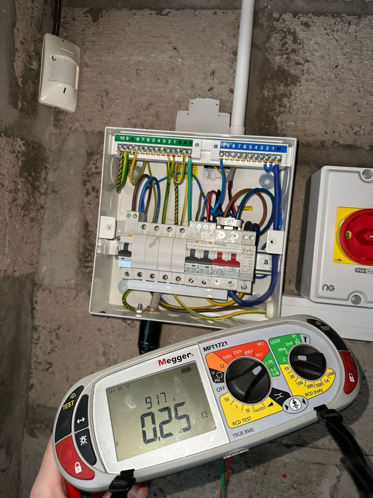 Megger tester checking a newly fitted consumer unit