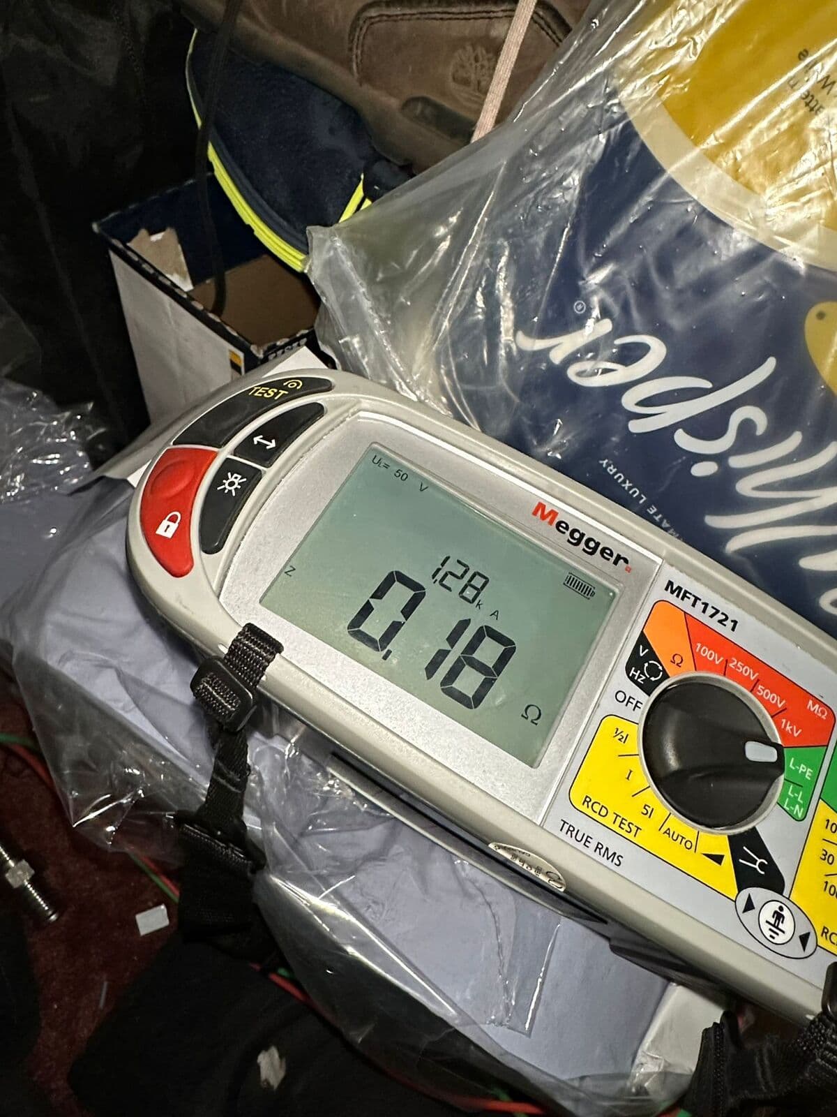 Megger multifunction tester showing a test reading